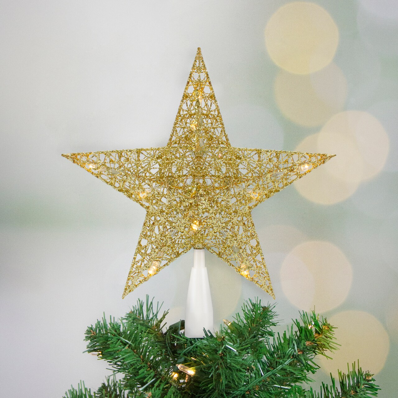 Northlight 10" LED Lighted Gold Glittered Star Christmas Tree Topper, Warm White Lights